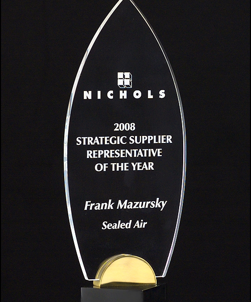 Flame Series 3/8" thick acrylic award on black and gold metal base.